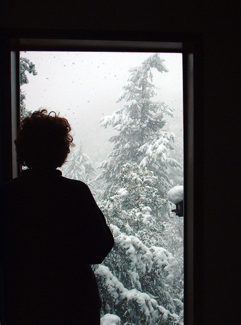 Brenda looking out at snow, at Locus Voci
