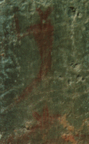 Closeup of petroglyph of human figure.